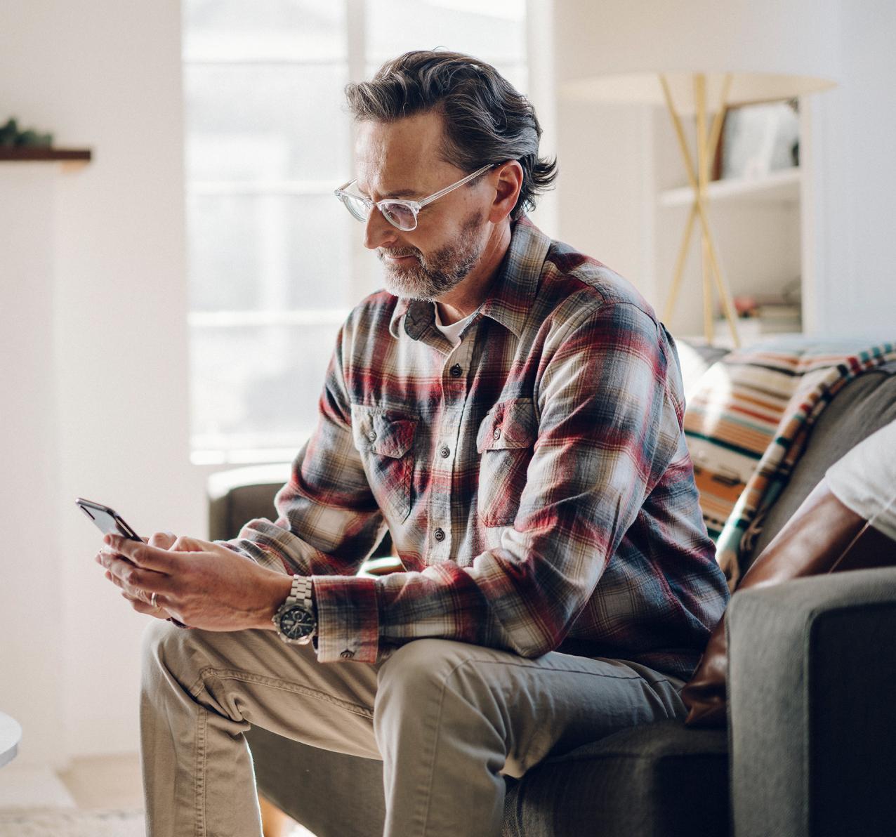 Man texting on cellphone